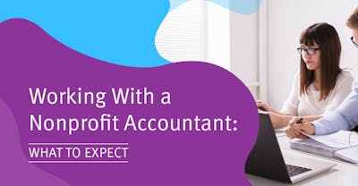 This image of two accountants at work represents what to expect when working with a nonprofit accountant, discussed in this guide.